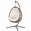 Sedia sospesa in rattan sintetico marrone con cuscino bianco