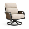 Poltrona girevole in metallo e vimini con cuscini beige